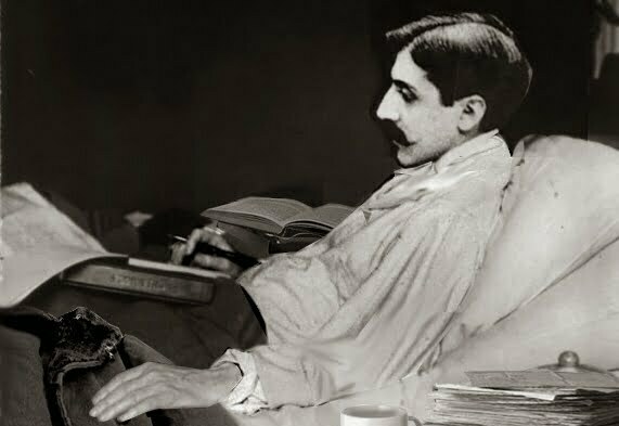 Marcel Proust working in bed